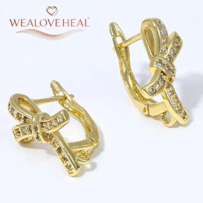 Crochets d'oreilles de luxe en laiton plaqué or 18 carats avec nœud papillon