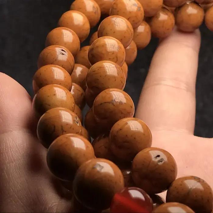 Bracelet Bodhi à petits yeux 108 perles de prière spirituelles pour hommes et femmes occasions de méditation et développement personnel