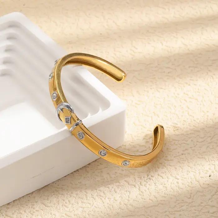 E.B.belle Bracelet fin pour femme en acier inoxydable doré 18 carats avec boucle argentée et zircon