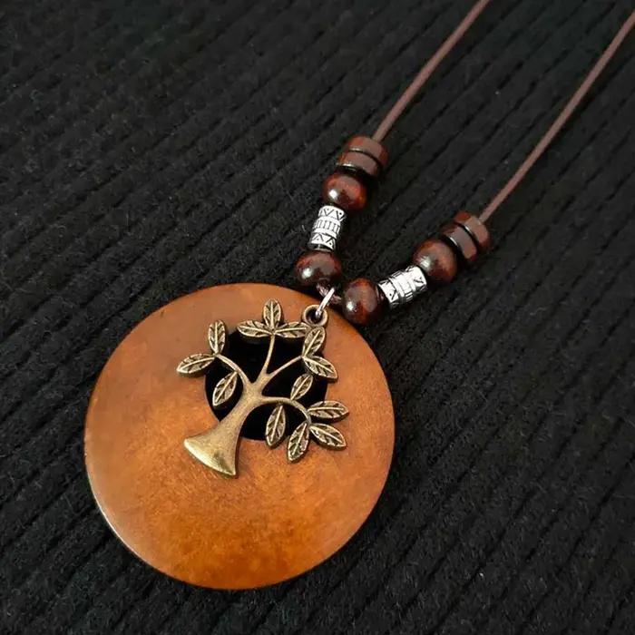 Collier en bois de style ethnique vintage avec pendentif perlé