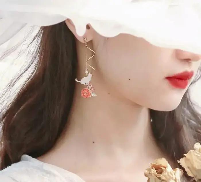 Boucles d'oreilles pendantes en forme de fleur rose pour femmes