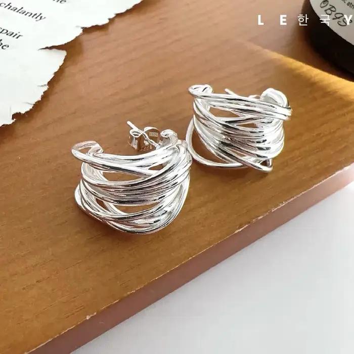 Boucles d'oreilles lignes Interware couleur argent pour femmes
