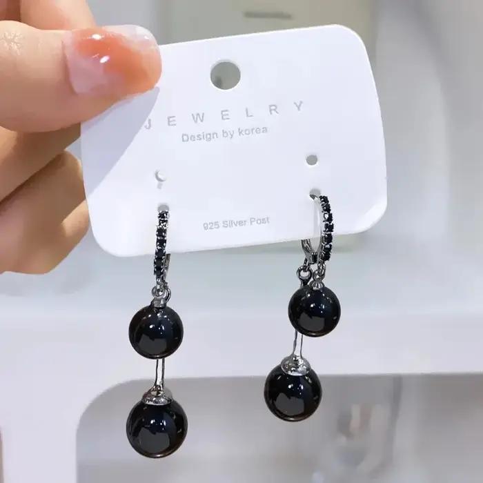 Boucles d'oreilles pendantes en perles noires pour femmes