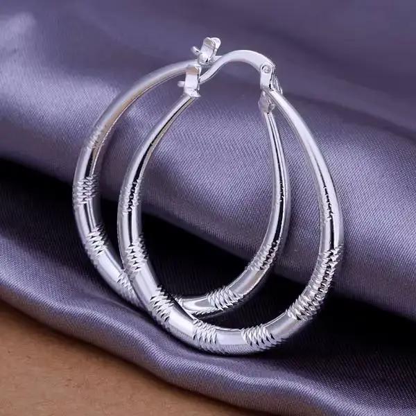 Belle boucle d'oreille en argent regardé 925 pour femme