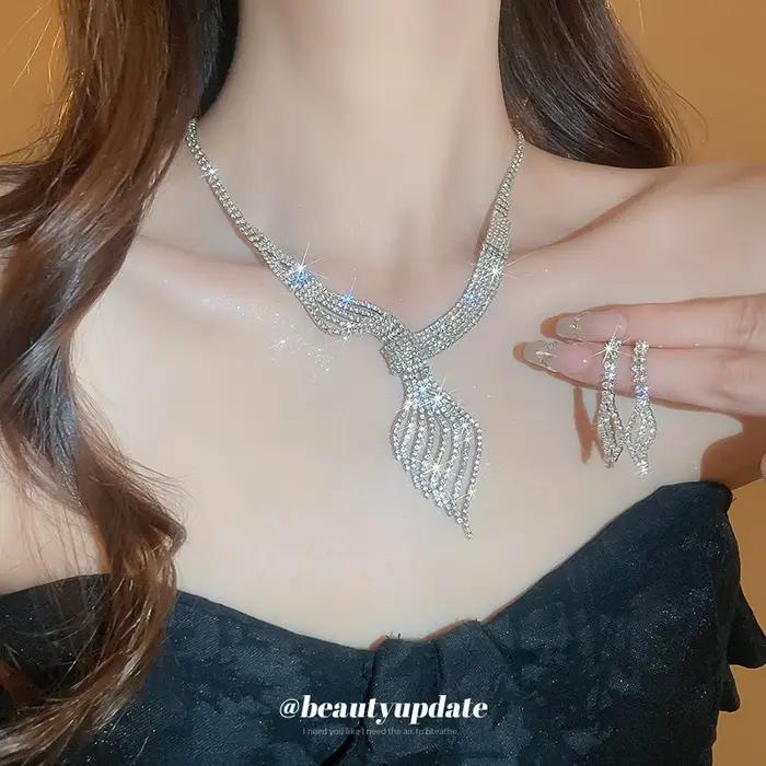 Ensemble collier et boucles d'oreilles européens et américains sertis de diamants