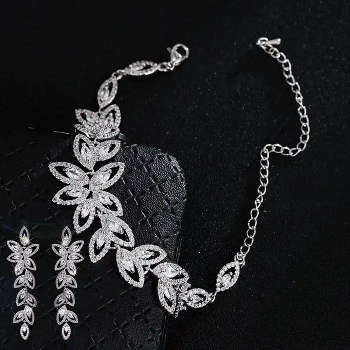 SUGO – ensemble de boucles d'oreilles en zircone pour femme, bijoux de luxe, brillant, exquis, fleur, haute qualité, élégant, de dîner, nouvelle mode