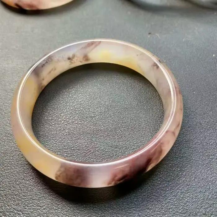 Bracelet en jade de soie d'or naturel sculpté à la main