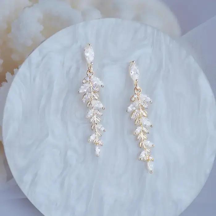 Boucles d'oreilles à breloques en feuilles d'or véritable 18 carats pour femmes