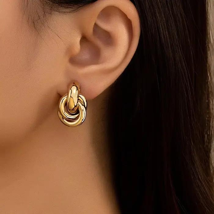 Boucles d'oreilles créoles à nœud en acier inoxydable pour femmes, plaqué or et argent brillant, tendance, bijoux à la mode, cadeaux