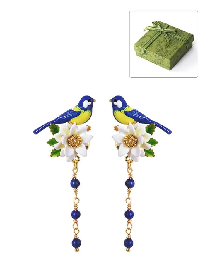 Boucles d'oreilles pompon oiseau bleu fleur blanche