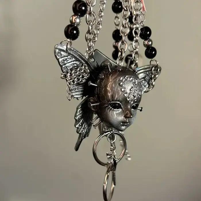 Collier Punk visage humain foncé