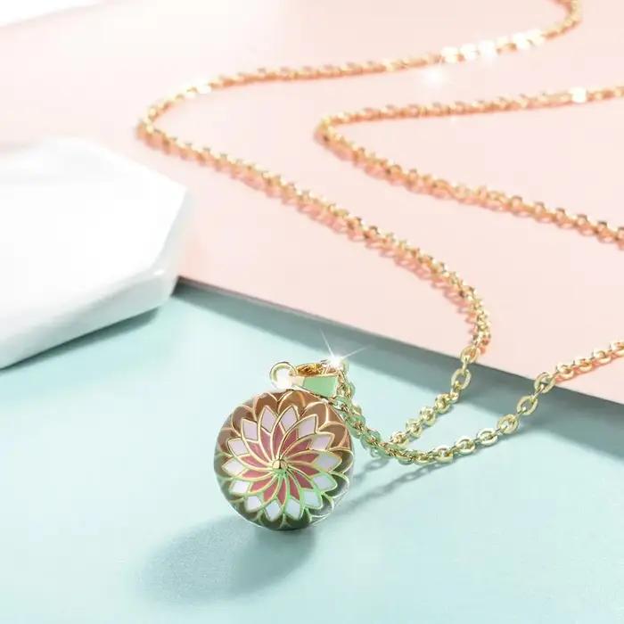Collier boule d'harmonie rose Orange pendentif