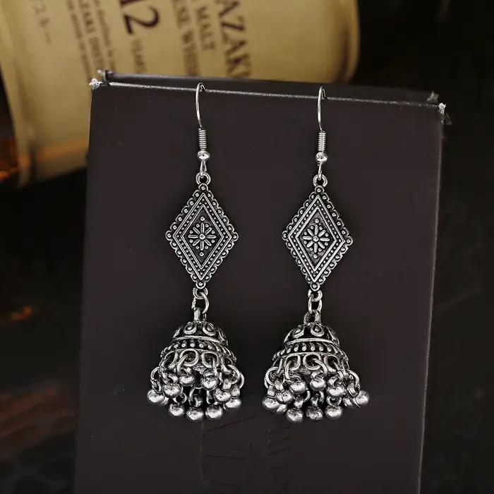 Boucles d'oreilles vintage ethniques en alliage de zinc pour femmes, élégantes et originales à porter pour des occasions spéciales et la vie quotidienne