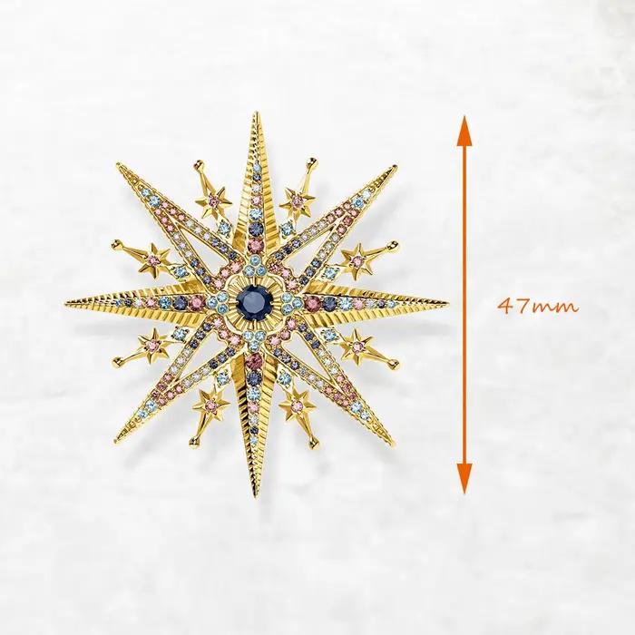 Broche plaquée or étoile royale colorée