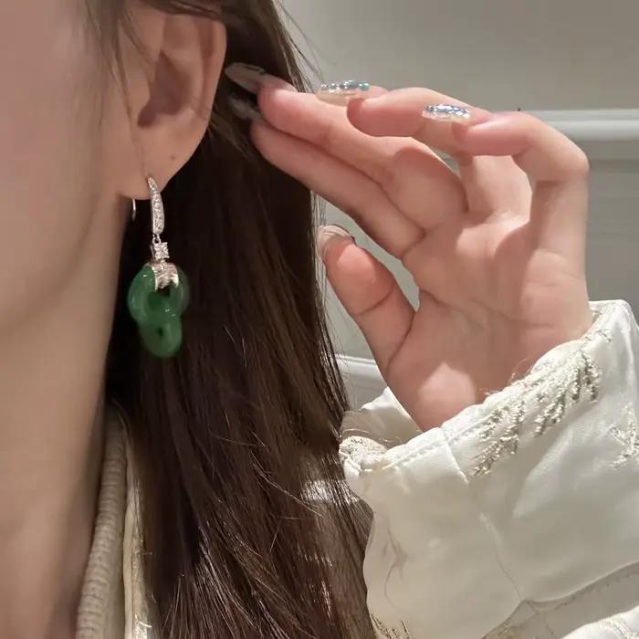 Boucles d'oreilles entrelacées fraîches en argent 925 incrusté de diamants