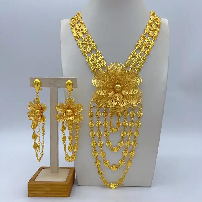 Parure de luxe éthiopienne avec collier long à fleurs et boucles d'oreilles pour mariée, couleur or