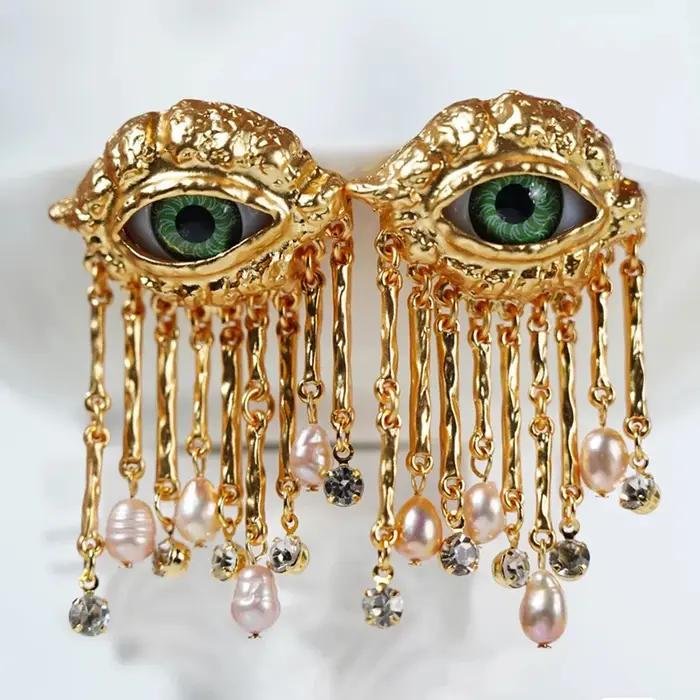 Boucles d'oreilles avec pompon en biscuits perlé pour femmes