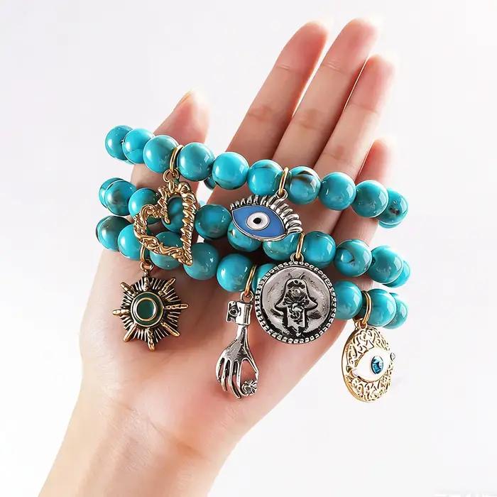 Bracelet bohème turquoise multi-breloques avec breloque œil porte-bonheur