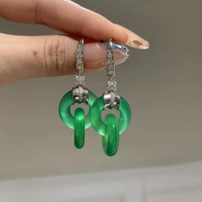 Boucles d'oreilles entrelacées fraîches en argent 925 incrusté de diamants