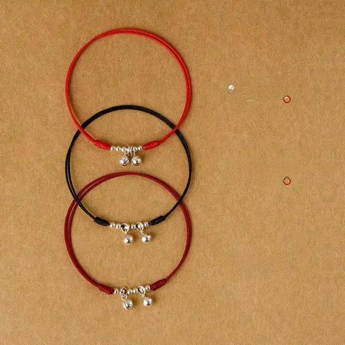 Bracelet de cheville en corde rouge tissée avec cloches et perles de chance bouddhistes pour femmes occasions spéciales cadeaux de couple amitié