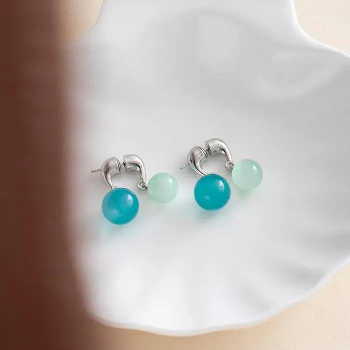 Boucles d'oreilles élégantes d'été