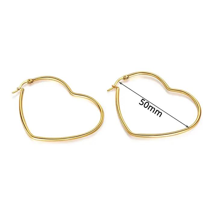 1 paire de boucles d'oreilles créoles