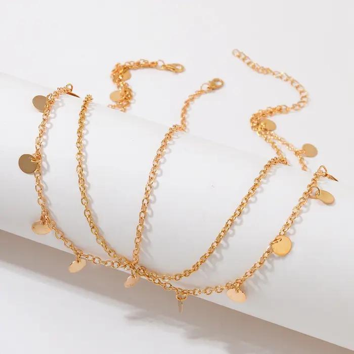 Chaîne de tête tendance en sequins métalliques dorés pour femmes