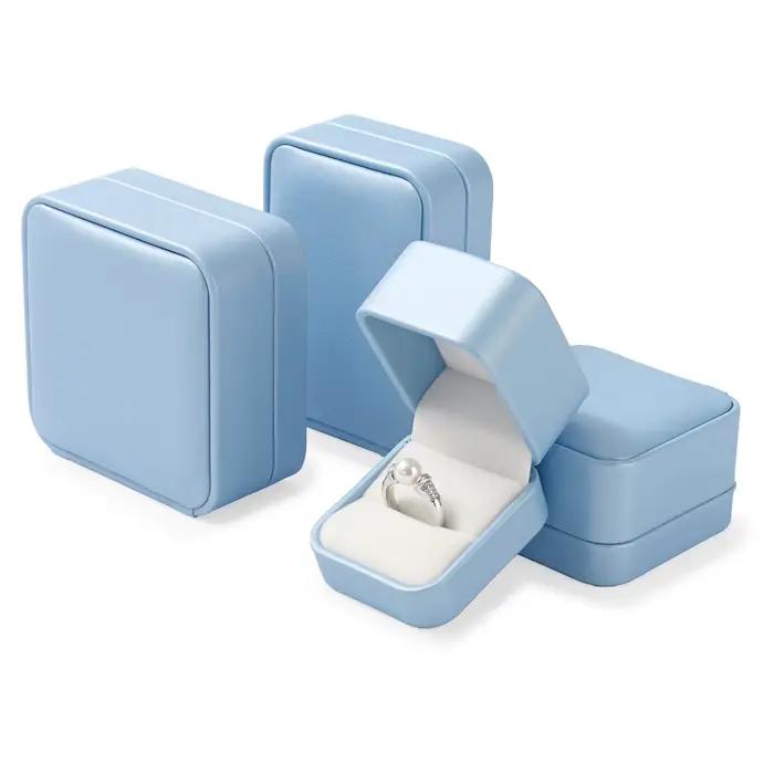 Boîte à bijoux bleue de qualité supérieure avec doublure en velours pour rangement et protection de colliers bagues boucles doreilles et bracelets occasions spéciales famille bijoutier