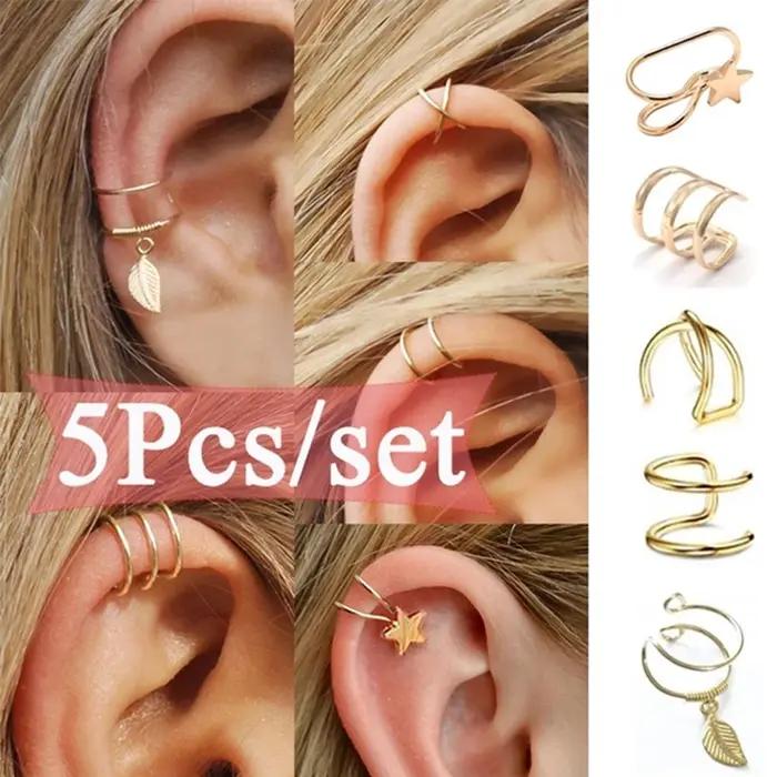 Boucles d'oreilles à clip en forme d'étoile géométrique pour femme en alliage de zinc avec finitions plaqué rhodium or rose et argent pour occasions spéciales