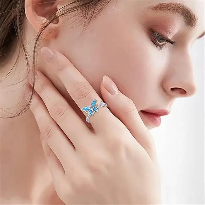 Bague anti-stress de luxe en forme de papillon et tournesol pour femme