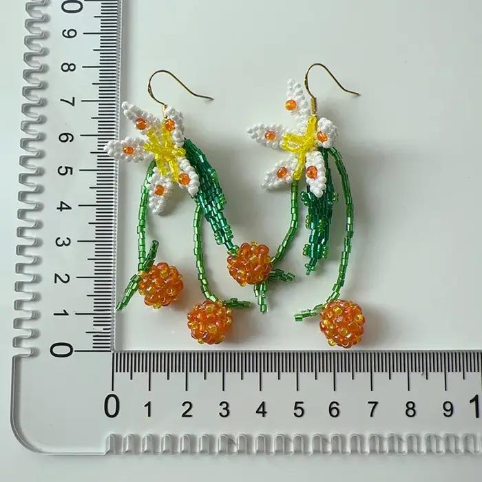 Boucles d'oreilles longues élégantes en forme de fleur
