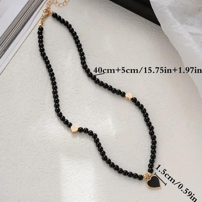 Collier décoratif bohème en forme de cœur perlé fait à la main