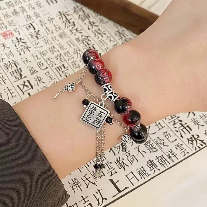 Bracelet perlé rouge de style chinois pour femme