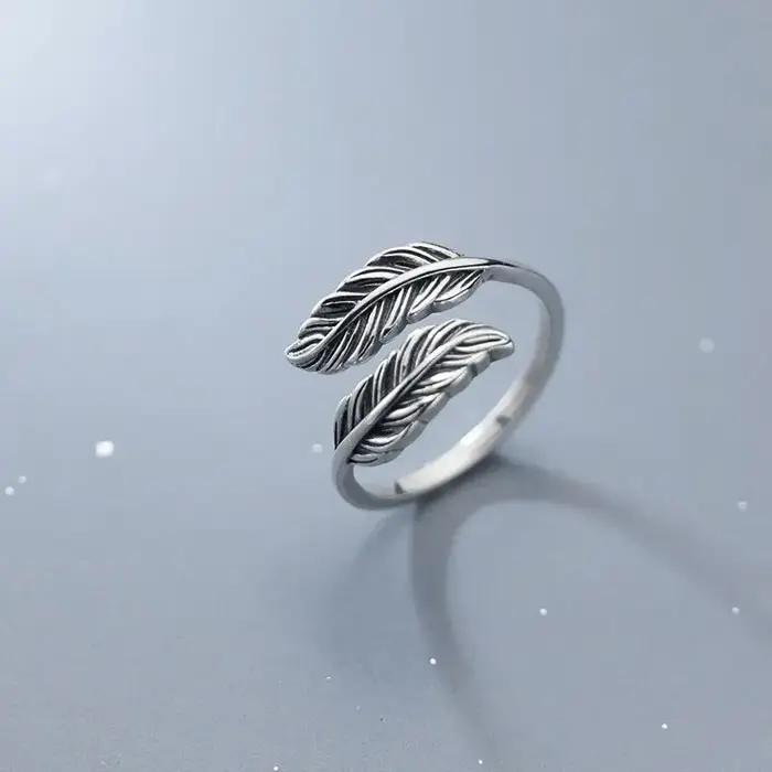Bague en argent sterling 925 motif plume élégante pour femmes occasions spéciales engagement anniversaire mariage cadeau chic