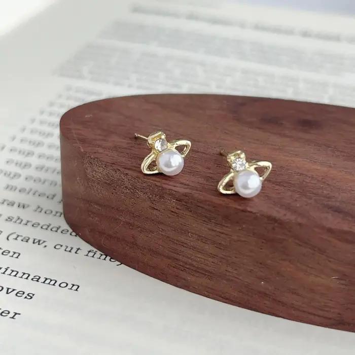 Mini Boucles d'oreilles clous Saturne en perles pour femme