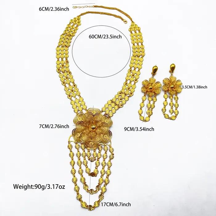 Parure de luxe éthiopienne avec collier long à fleurs et boucles d'oreilles pour mariée