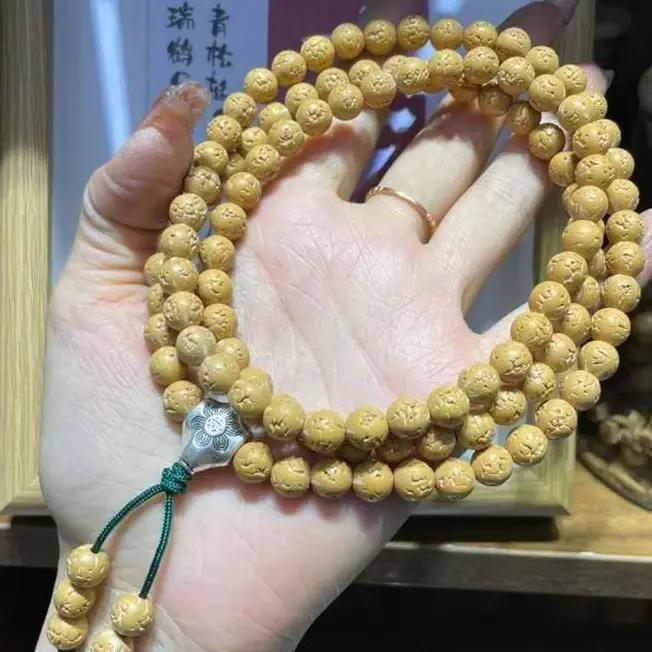 Bracelet multi-tours en perles rondes lisses marron