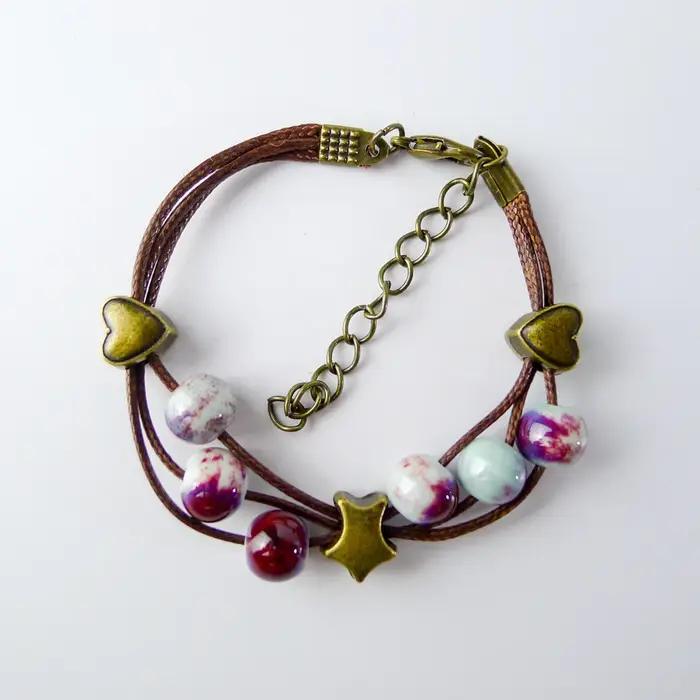 Bracelet en céramique bohème fait à la main avec breloque plante pour femmes occasions spéciales
