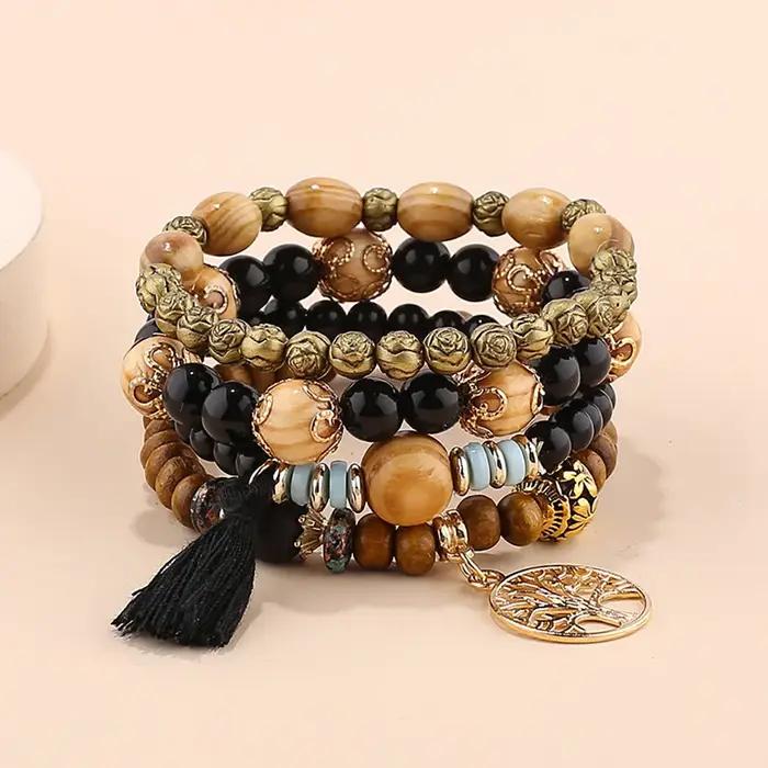 Ensemble de bracelets bohème à pompons noirs pour femmes