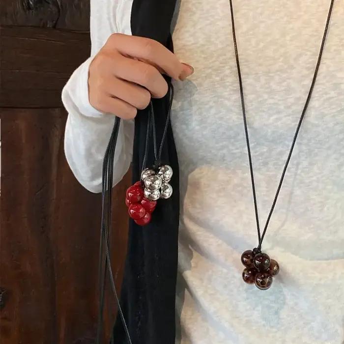 Collier pendentif en perles rondes design azole pour femmes