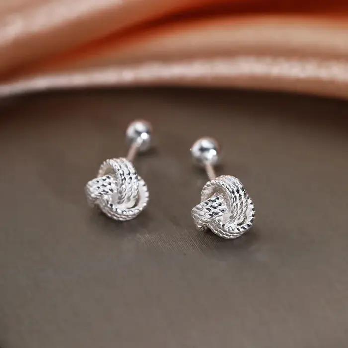 Boucles d'oreilles à vis croisées couleur argent pour femme