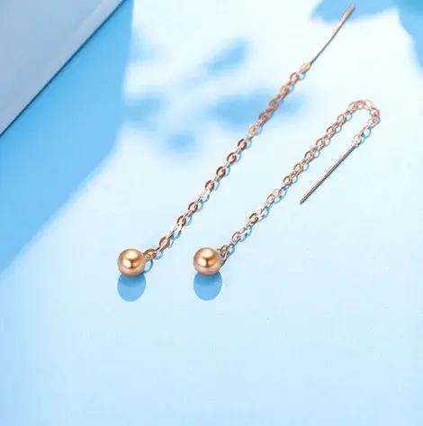 Boucles d'oreilles longues boule en or 18 carats pour femmes