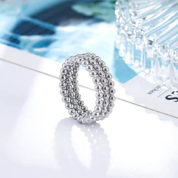 Bague trois en un en forme de chaîne de perles