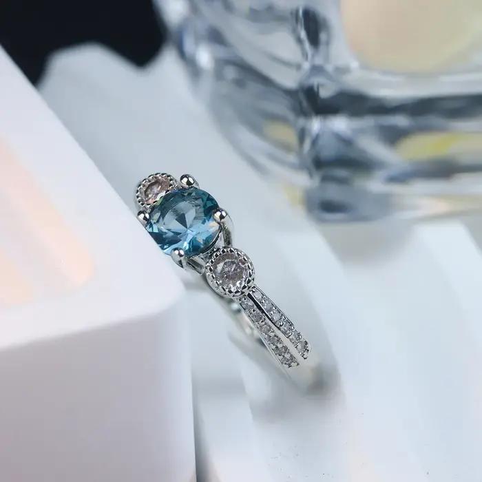 Bague de fiançailles en argent sterling avec topaze bleue pour femme