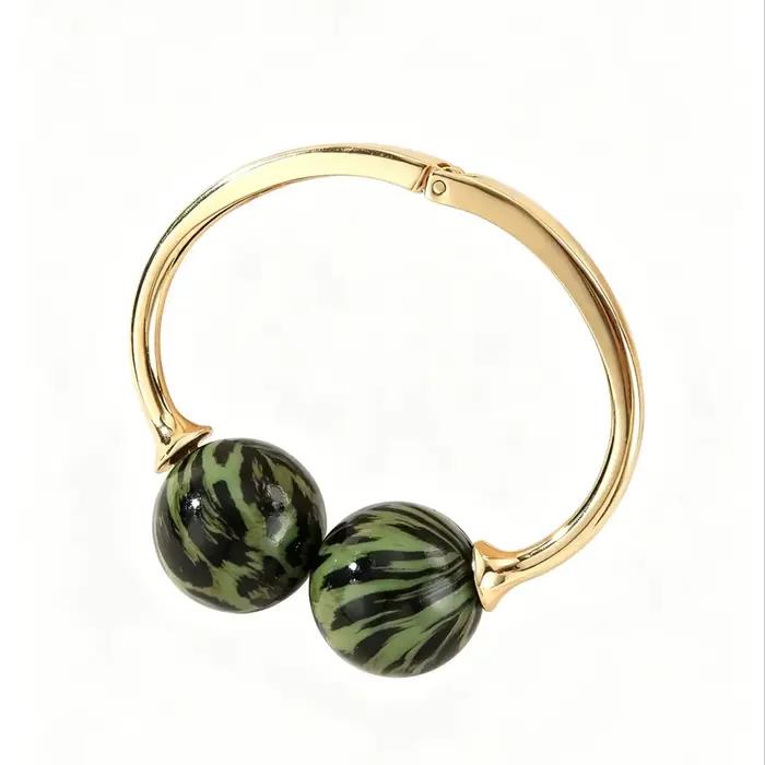 Bracelet en acrylique ouvert avec perles doubles sphériques