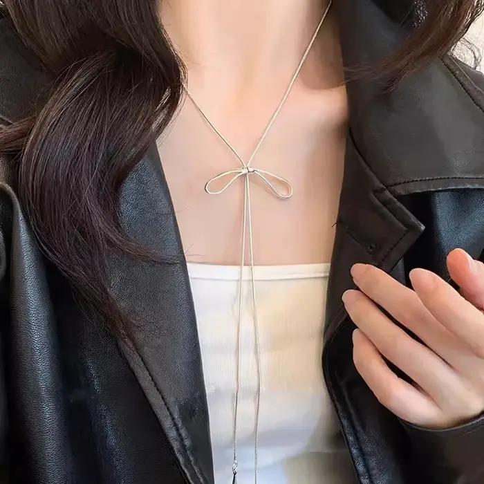 Collier long avec nœud papillon pour femme, cordon de proximité simple, gland de document en argent,
