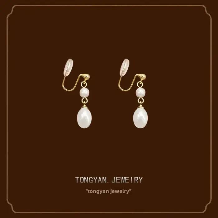 Boucles d'oreilles à clip élégantes en perles NicheDesign