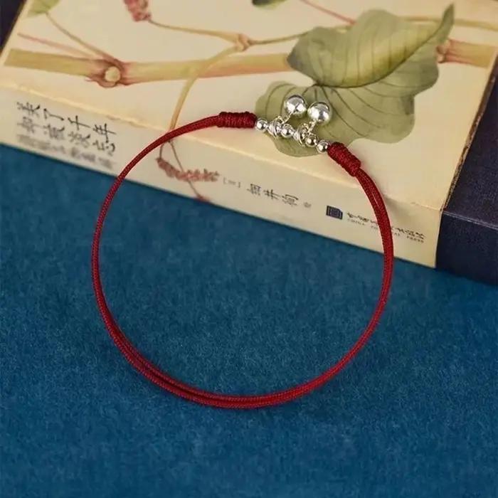 Bracelet de cheville en corde rouge tissée avec cloches et perles de chance bouddhistes pour femmes occasions spéciales cadeaux de couple amitié