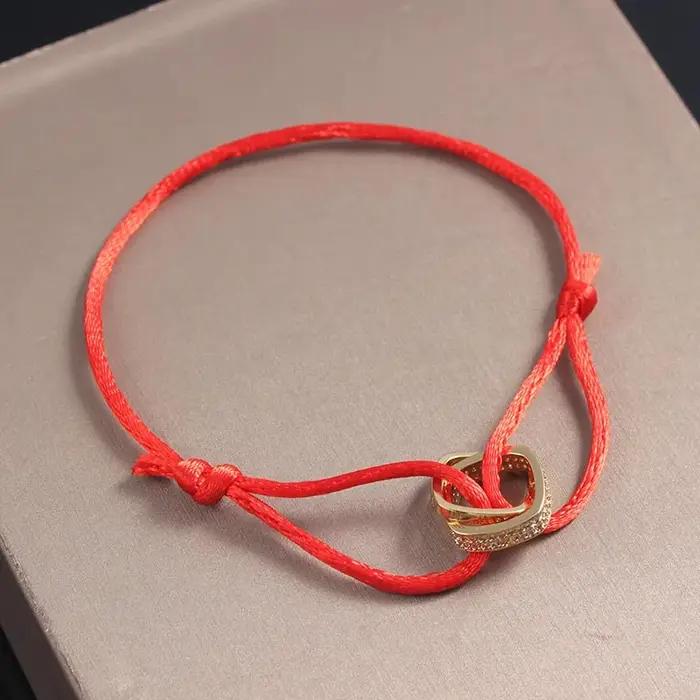 Bracelet en corde réglable avec chiffres interblocés à deux anneaux