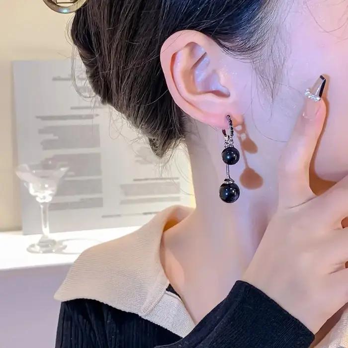 Boucles d'oreilles pendantes en perles noires pour femmes